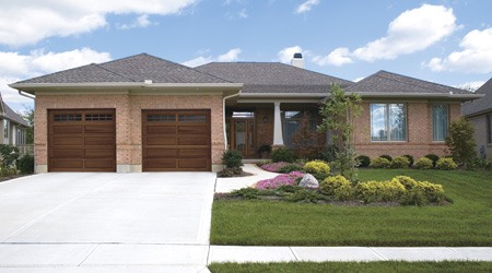 Clopay wood garage doors on a residential two door garage. 