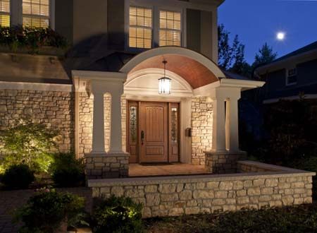 Home with Clopay Rustic Collection fiberglass entry door.