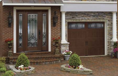 Home with Clopay Arbor Grove Collection fiberglass entry door.