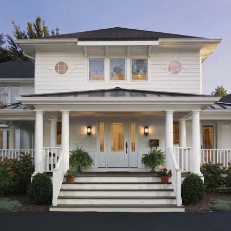 Home with Clopay painted smooth fiberglass entry door.