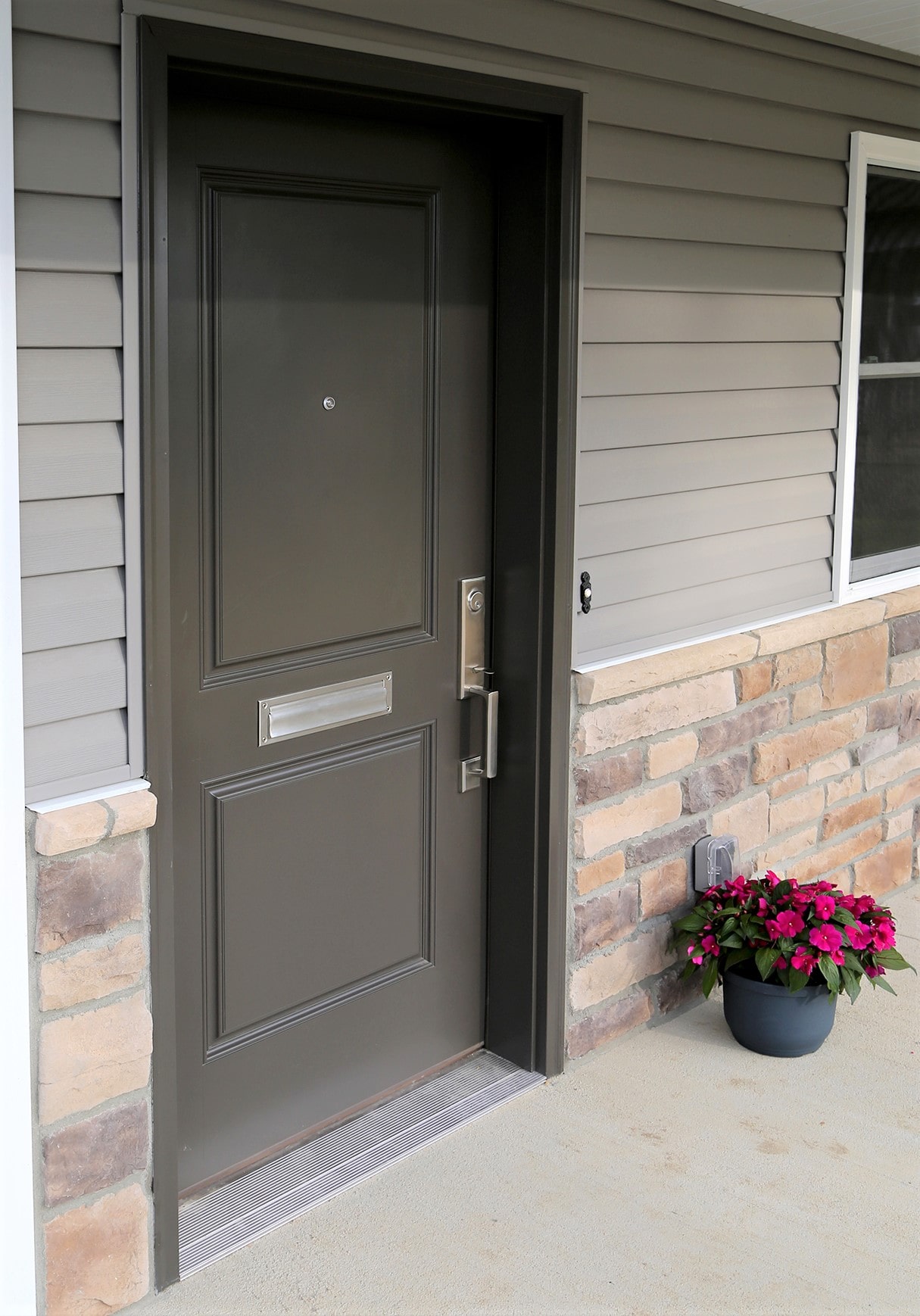 Entry Door with a Flower Pot on the Porch