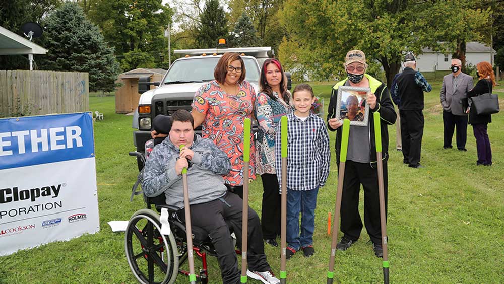 Habitat for Humanity Family with Shovels at groundbreaking