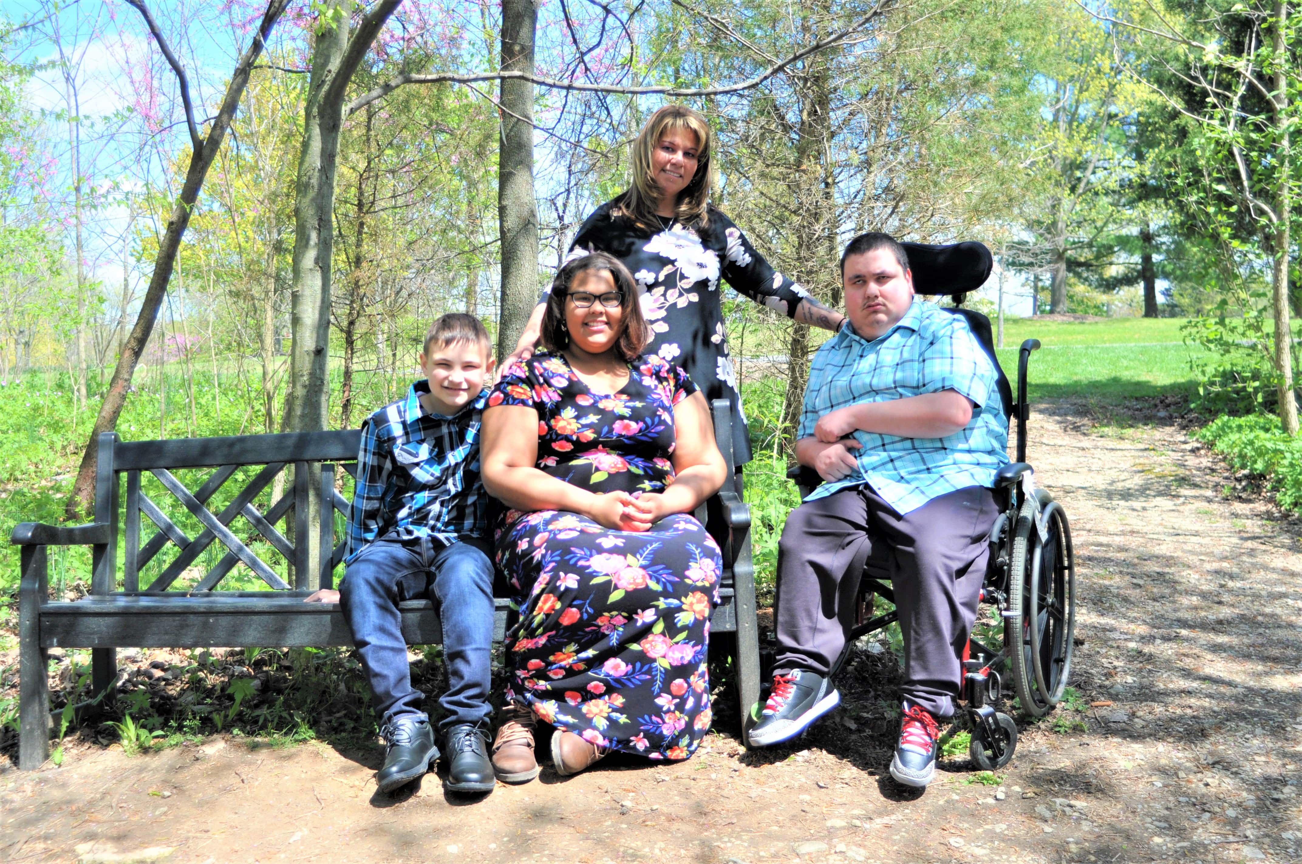 Marie Strunk and her family in a park