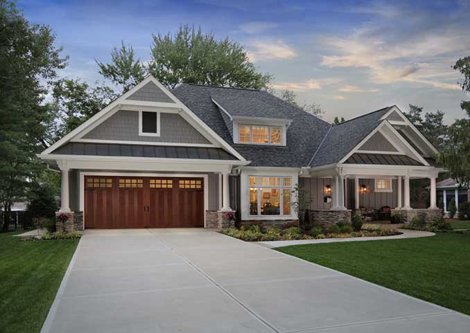 Canyon Ridge Ultragrain door on beautiful home with windows