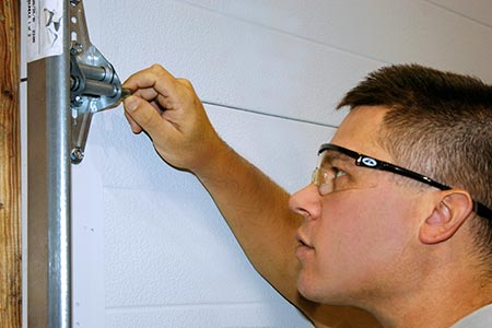 Tighten Rollers to help quiet a noisy garage door