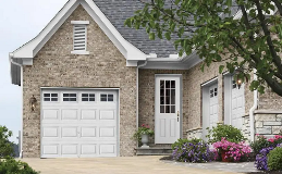 Steel Entry Door in White with Prairie Windows and coordinating Classic Steel white garage door