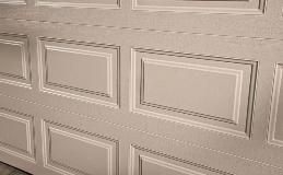 Classic Steel Garage Doors | Close up of Elegant Short panel design in Desert Tan Finish